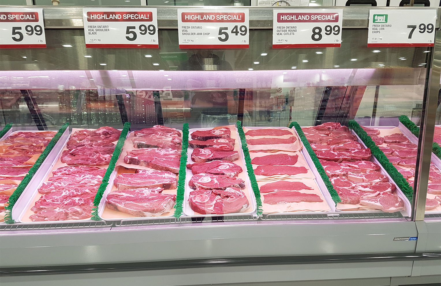 Studies of Pork Shelf Life in Refrigerated Grocery Store Meat Cabinets